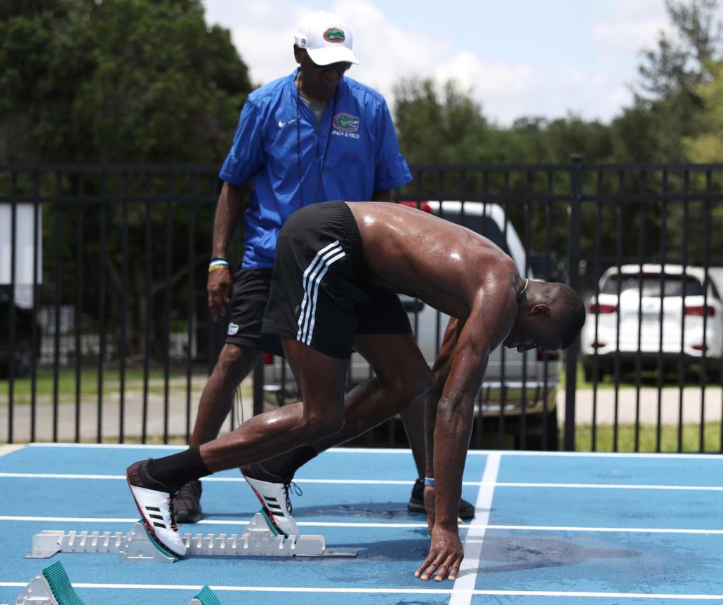 Florida Gators Head Track & Field Coach Mike Holloway and NCAA Champion track athlete Grant Holloway.